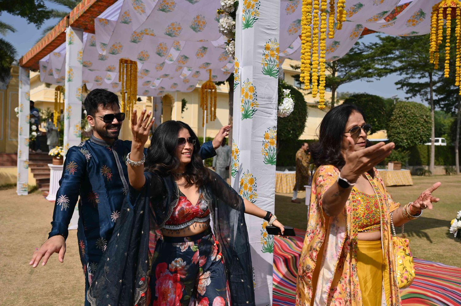 Guests dancing together at an outdoor celebration