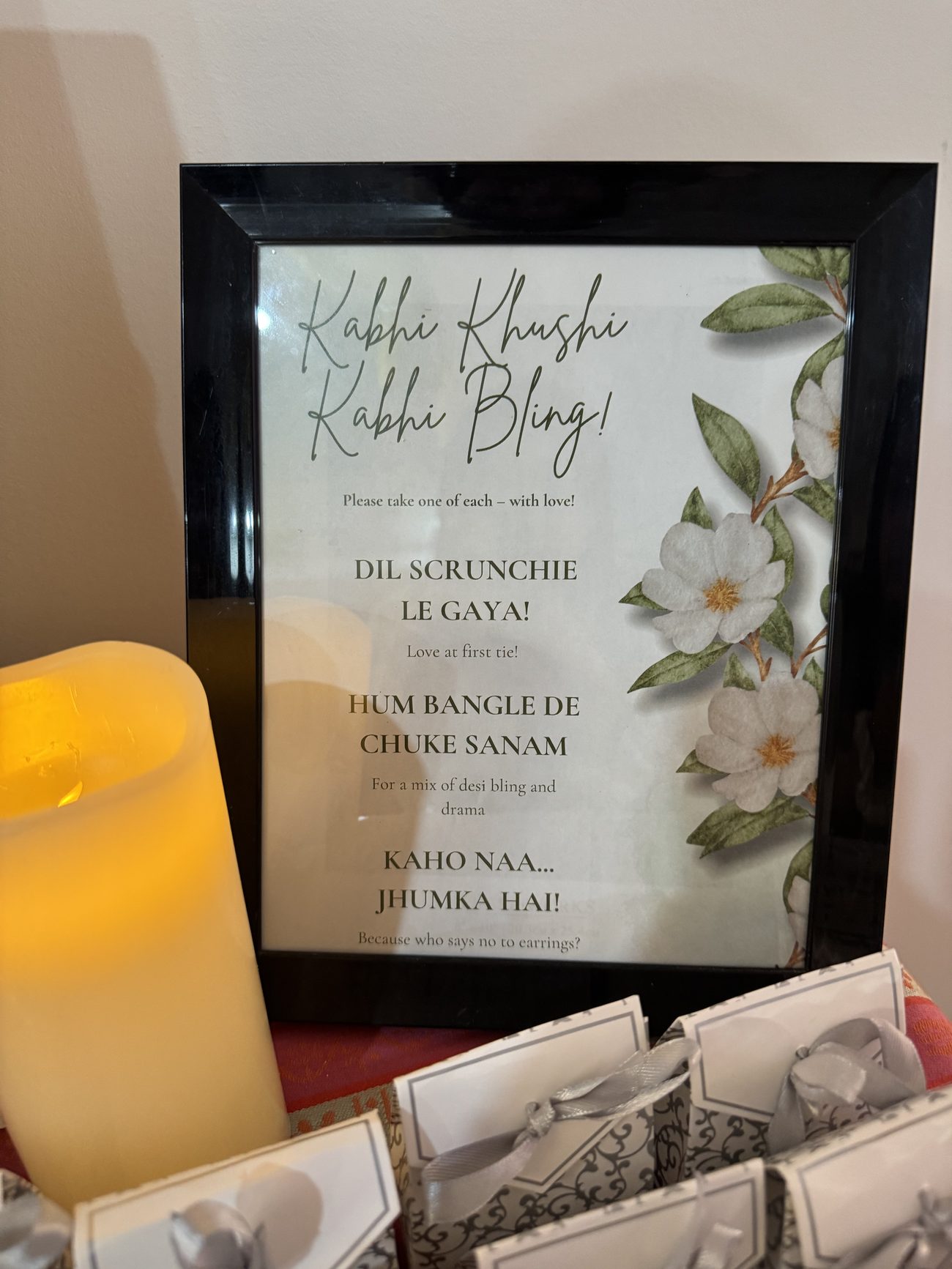 A styled favour and signage table